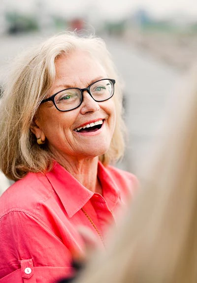 woman smiling after restorative care from North Georgia Smiles